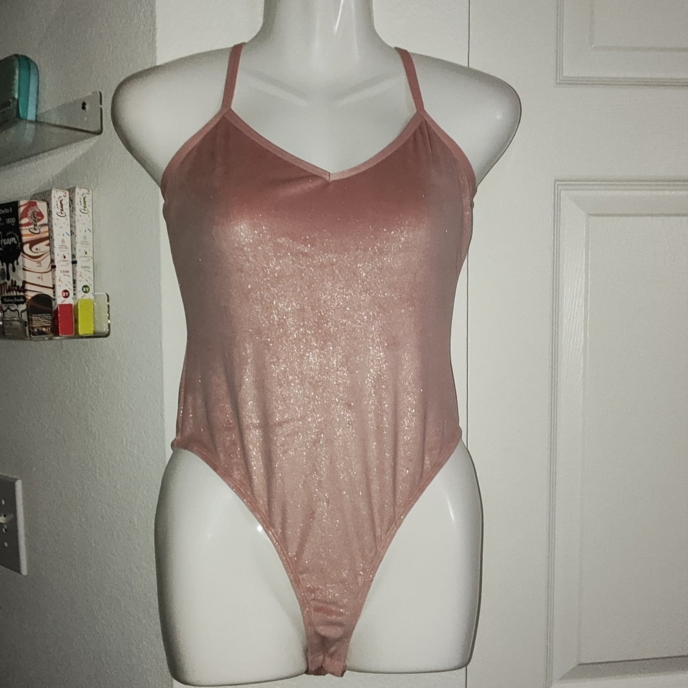 Pink body suit
